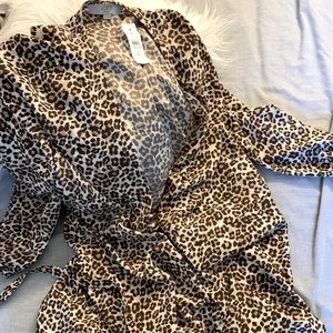 Cheetah print wrap around dress. New, never worn.